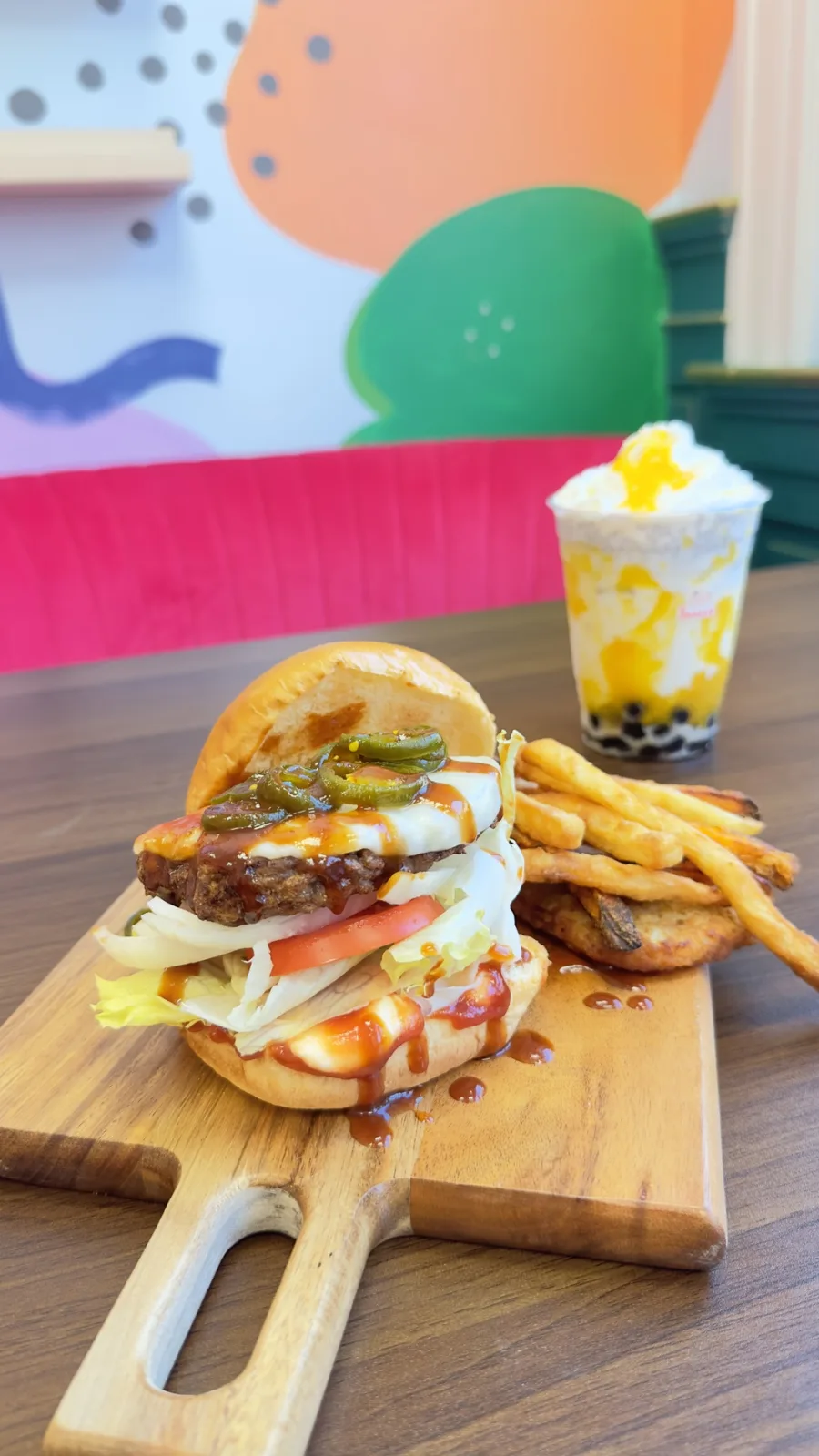 A burger, fries and bubble tea at the café